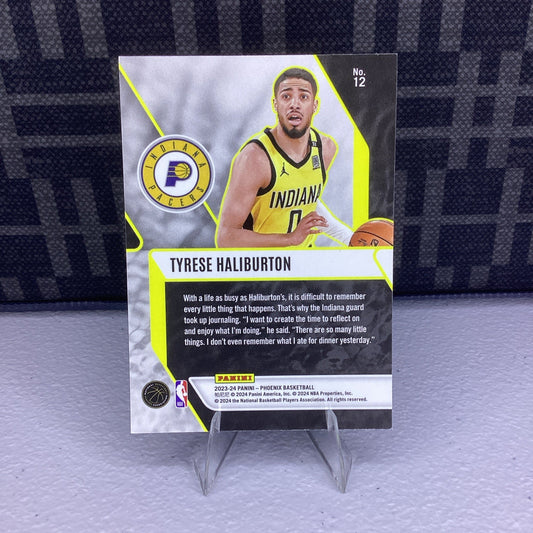 2023-24 Panini Phoenix Tyrese Haliburton Silver Prizm Fade to Black #12 Pacers
