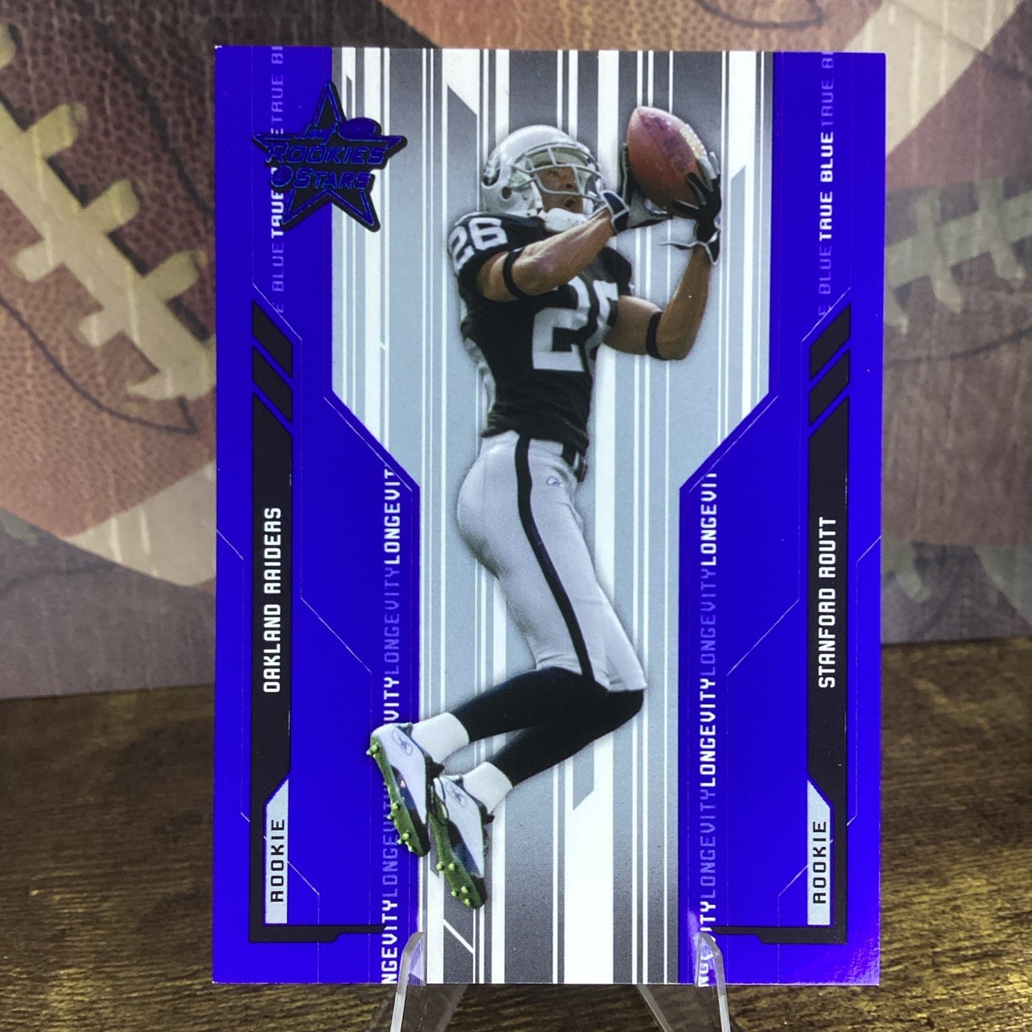 2005 Leaf Rookies & Stars Longevity Parallel True Blue /50 Stanford Routt RC