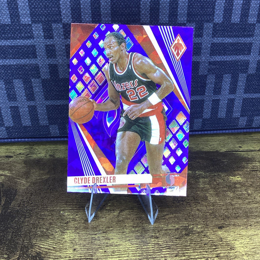 2023-24 Panini Phoenix Blue Ice #240 Clyde Drexler