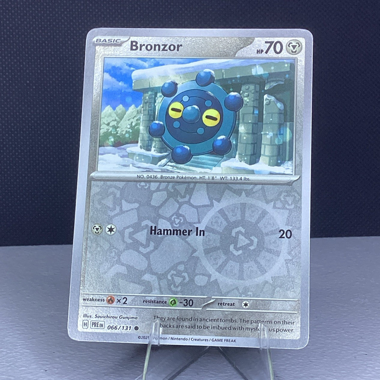 Pokemon Bronzor 066/131 Prismatic Evolutions Reverse Holo Card